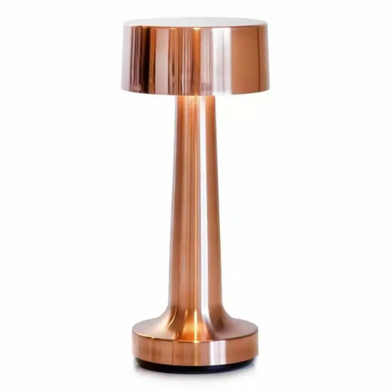 Front view of the Aurora bronze table lamp on a white background