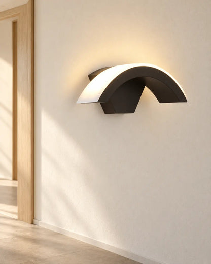 Lunara arc wall light on hallway wall