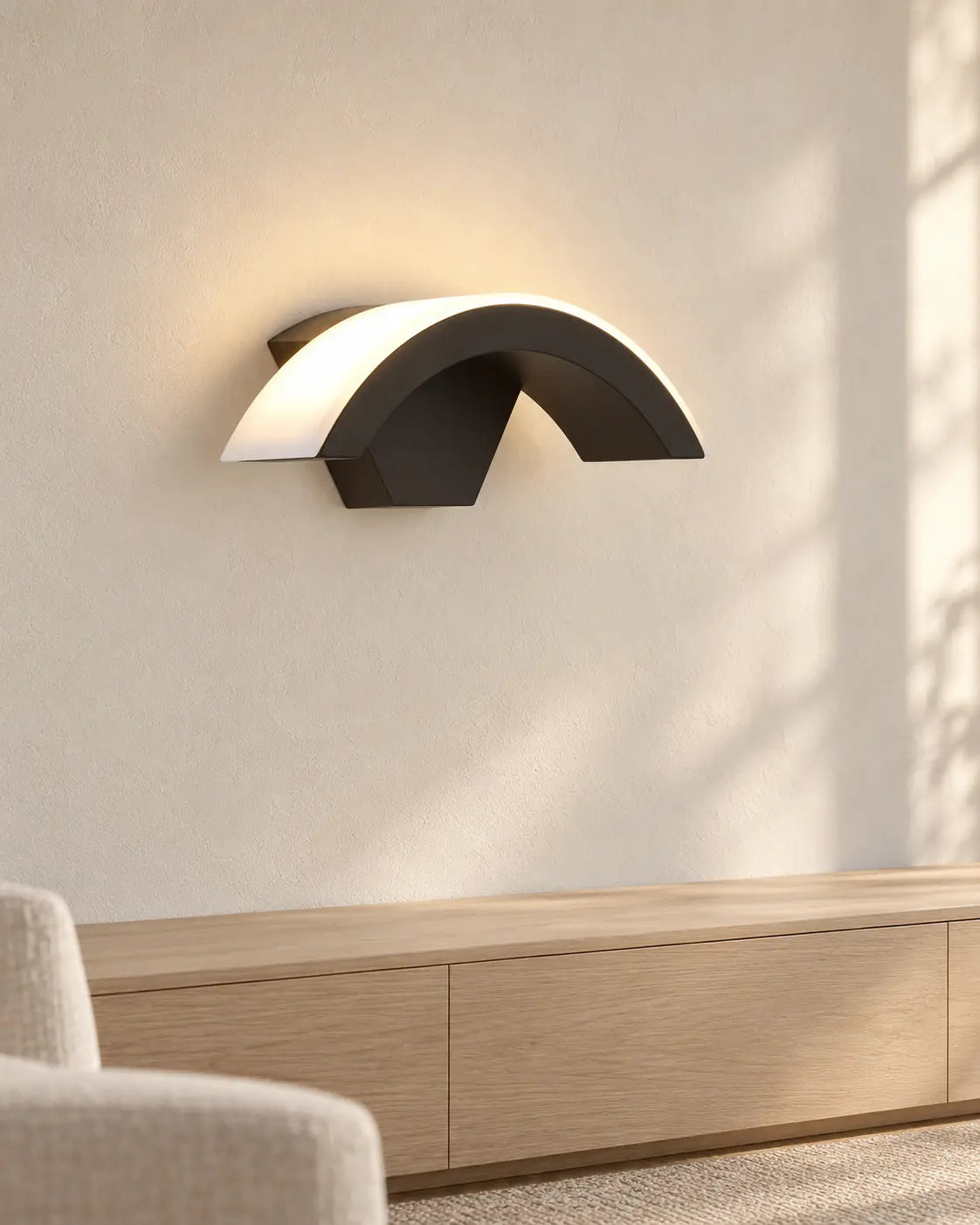 Lunara arc wall light above cabinet