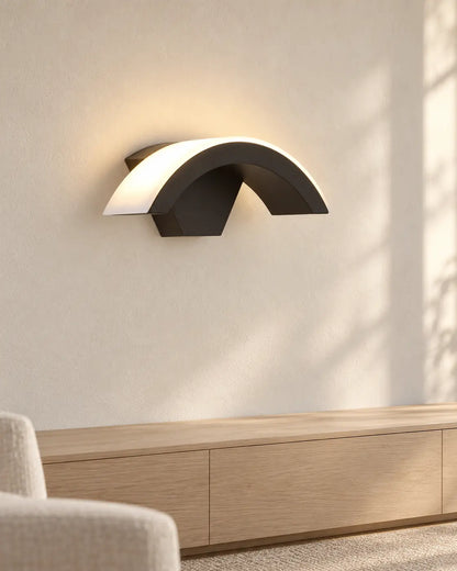 Lunara arc wall light above cabinet