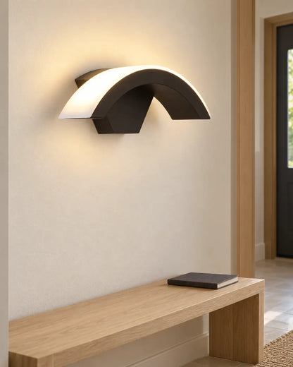 Lunara arc wall light over an entryway bench