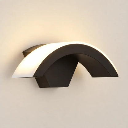 Lunara arc wall light on plain wall